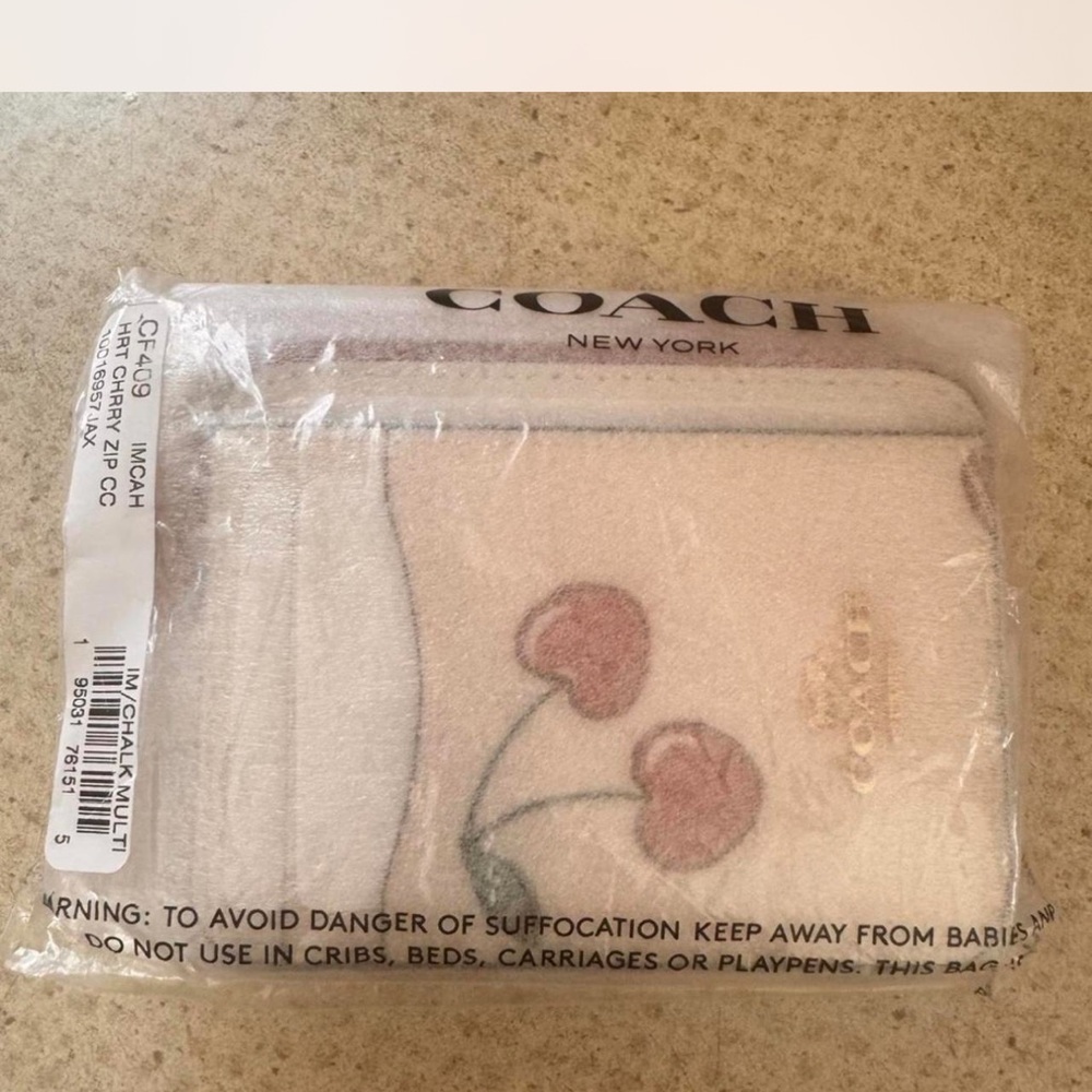 Coach White Wristlet with Pink Floral Design